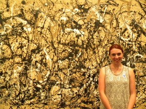 Greta by a Pollock painting.